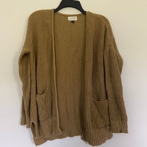 Green cardigan sweater